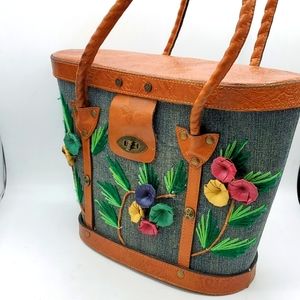 Patricia Nash tooled leather and denim bag